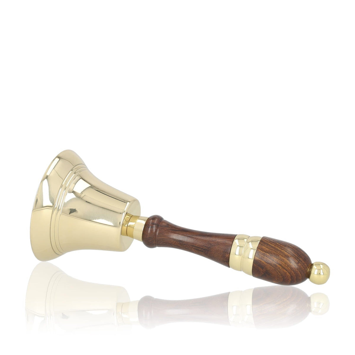Brass altar bell side view with polished brass body and carved brown wooden handle
