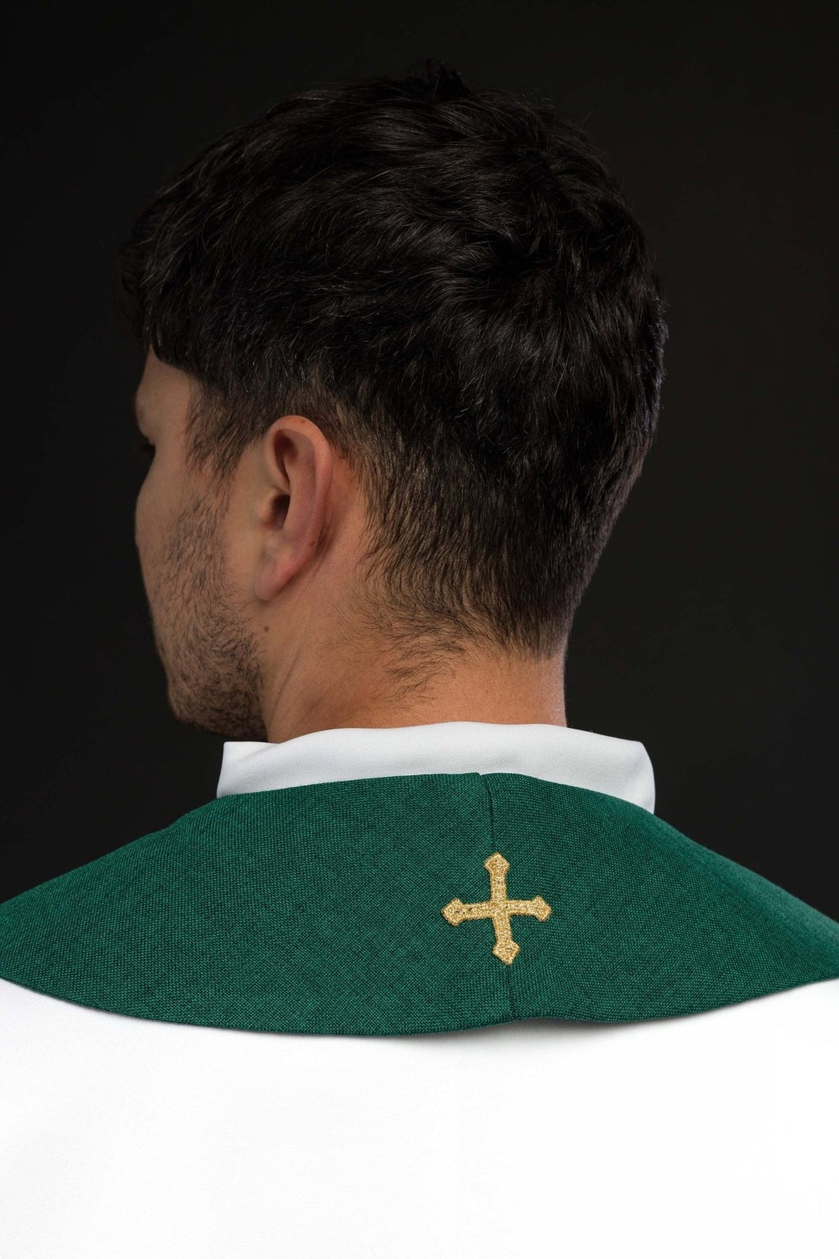 Green stole back view showing gold embroidered cross