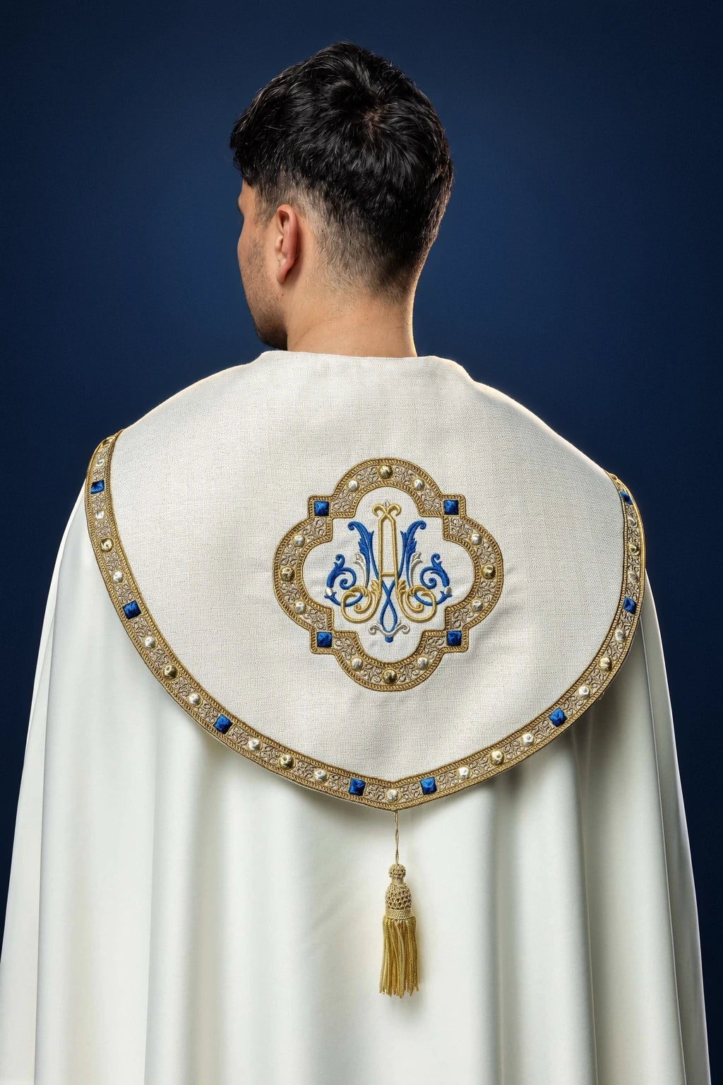 Embroidered Cope with Marian Coat of Arms, back view in ecru with gold and blue embroidery