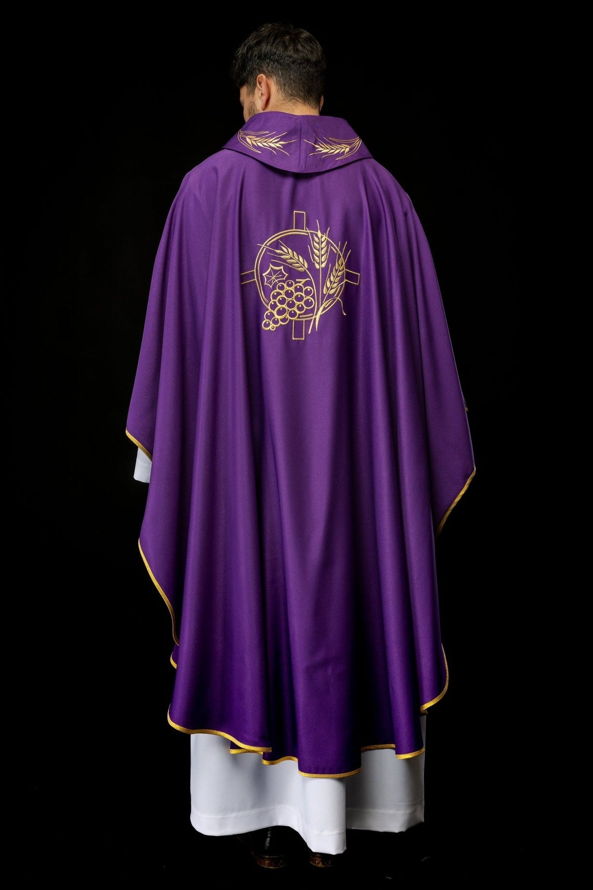 Purple chasuble back view with gold cross, wheat and grape embroidery