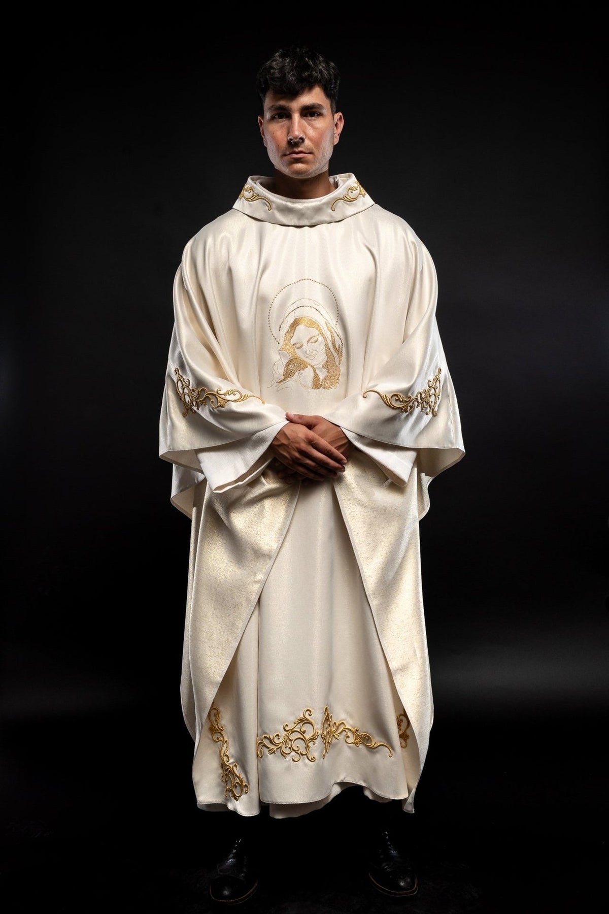 Liturgical chasuble front view with embroidered Our Lady embracing Jesus and gold trim
