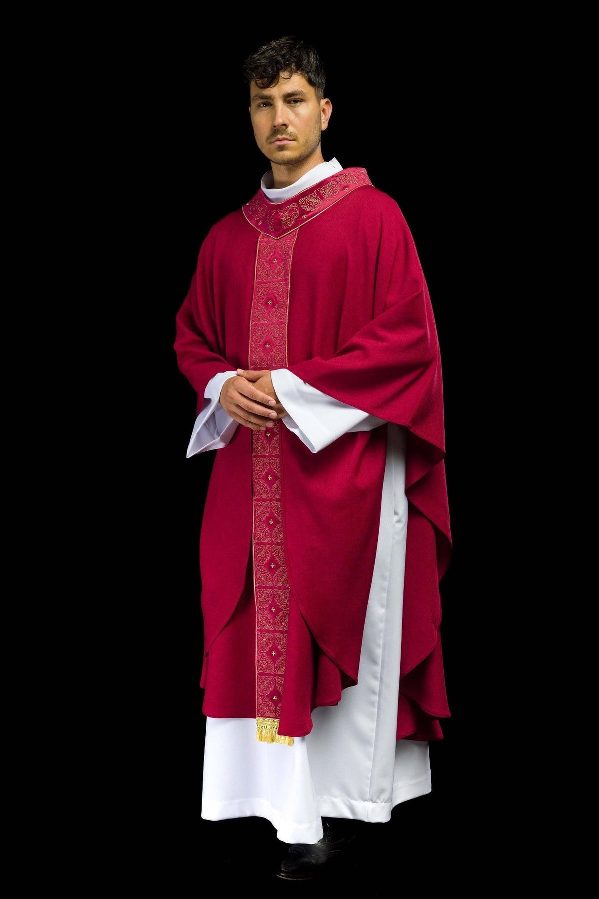 Red chasuble worn in a three-quarter front view with gold embroidery