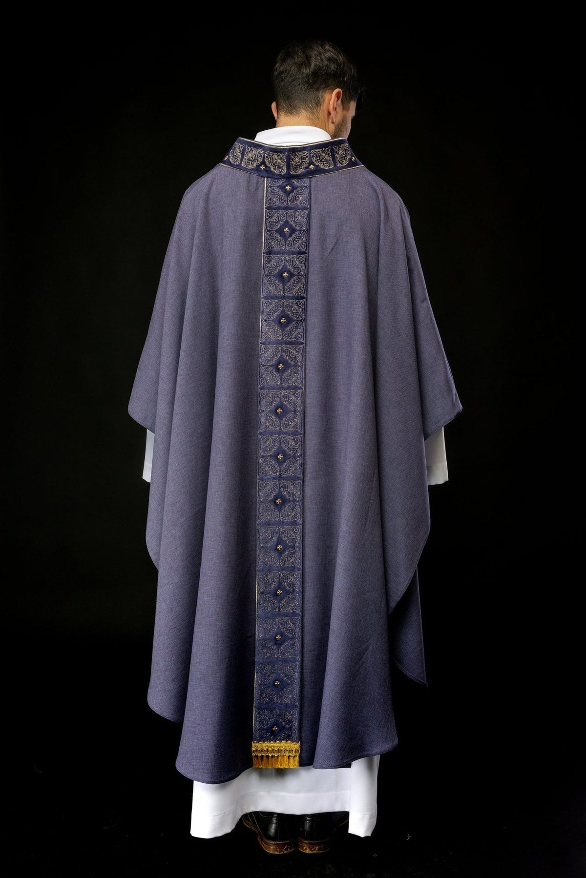 Purple chasuble full back view with embroidered orphrey and gold fringe