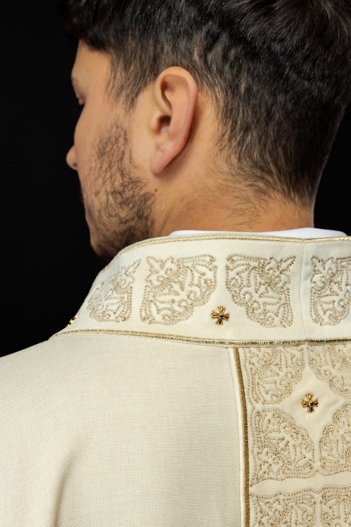Ecru chasuble close-up showing embroidered stand-up collar