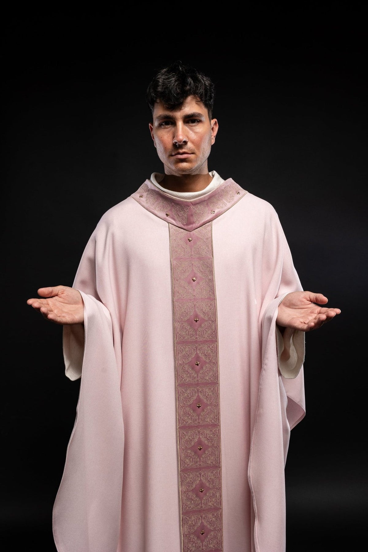 Rose chasuble front view with ornate embroidered orphrey and gold decorative studs
