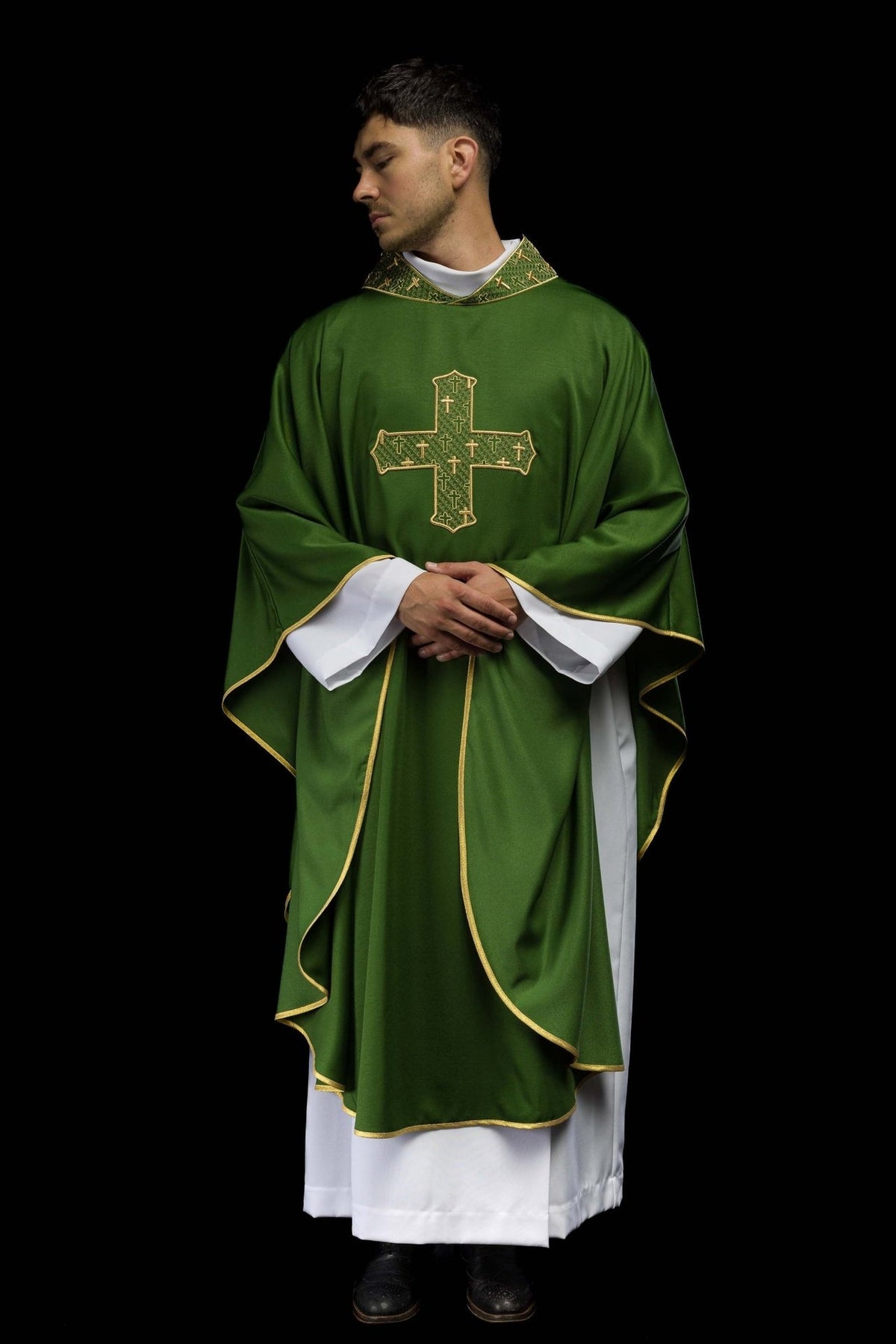 Green chasuble three-quarter front view with embroidered cross