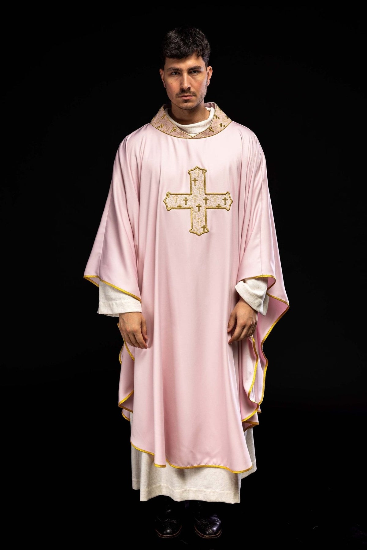 Rose chasuble front view with gold embroidered cross and gold-trimmed edges
