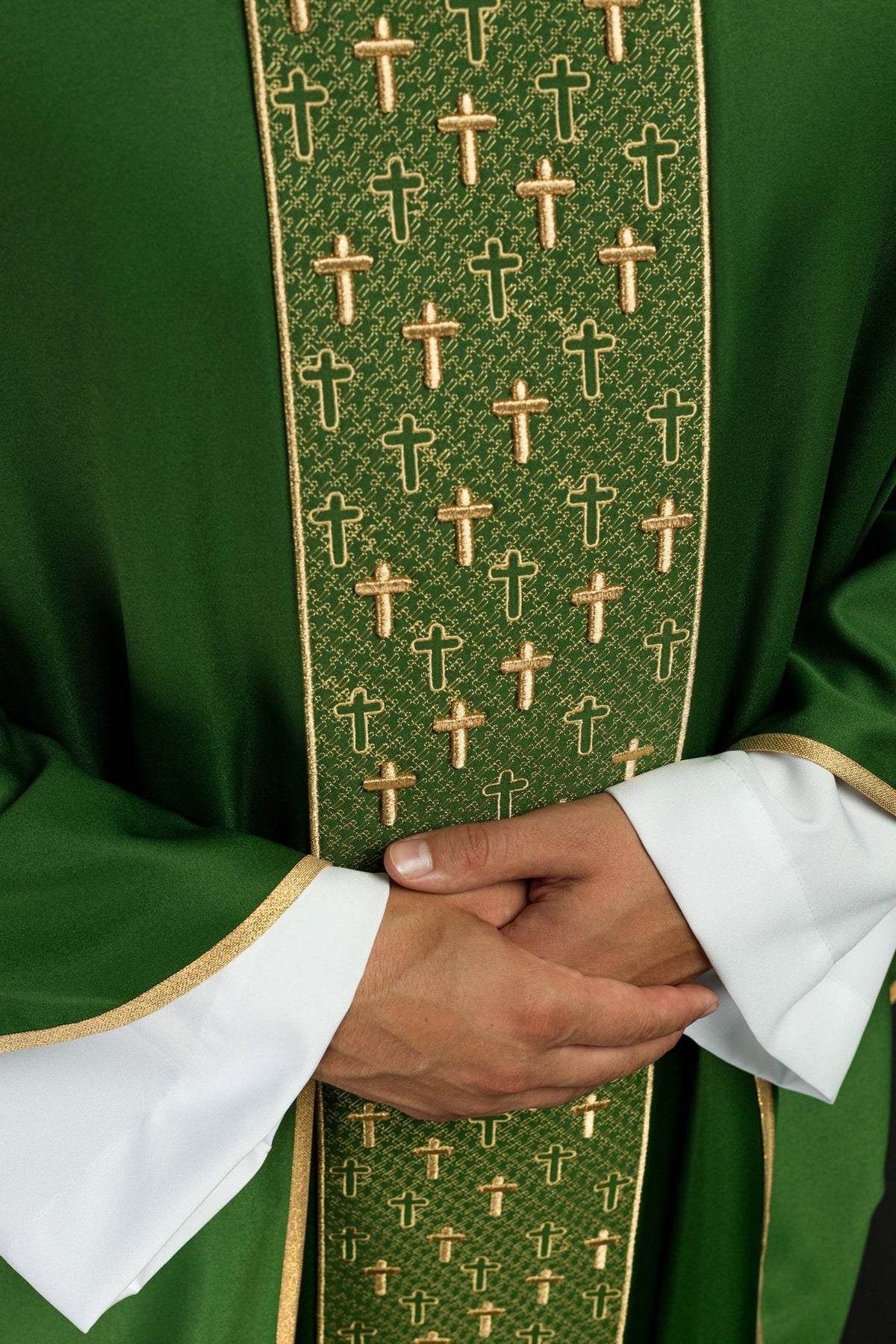 Green chasuble, close-up of richly embroidered gold cross orphrey