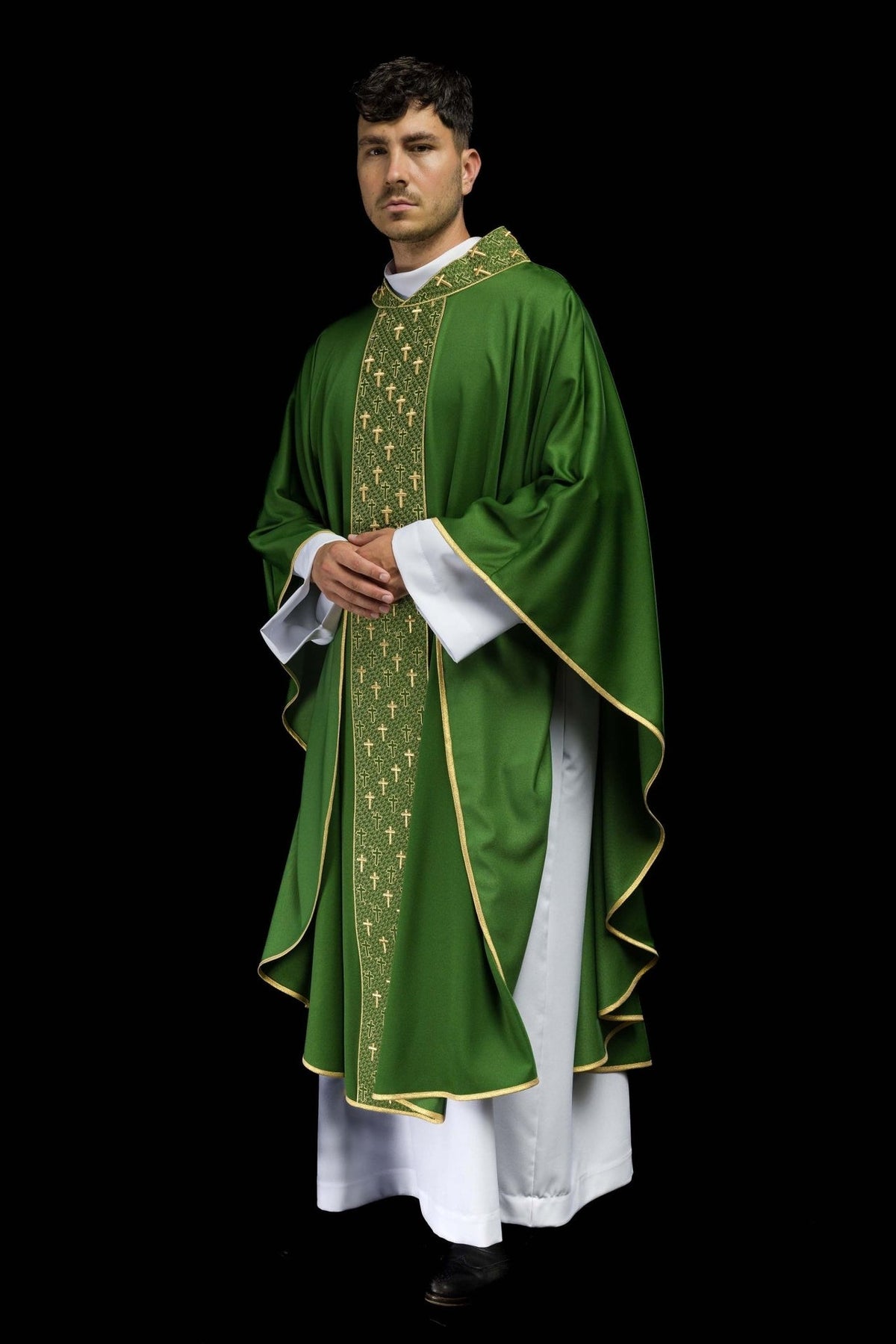 Green chasuble, angled front view with gold cross embroidery and edging