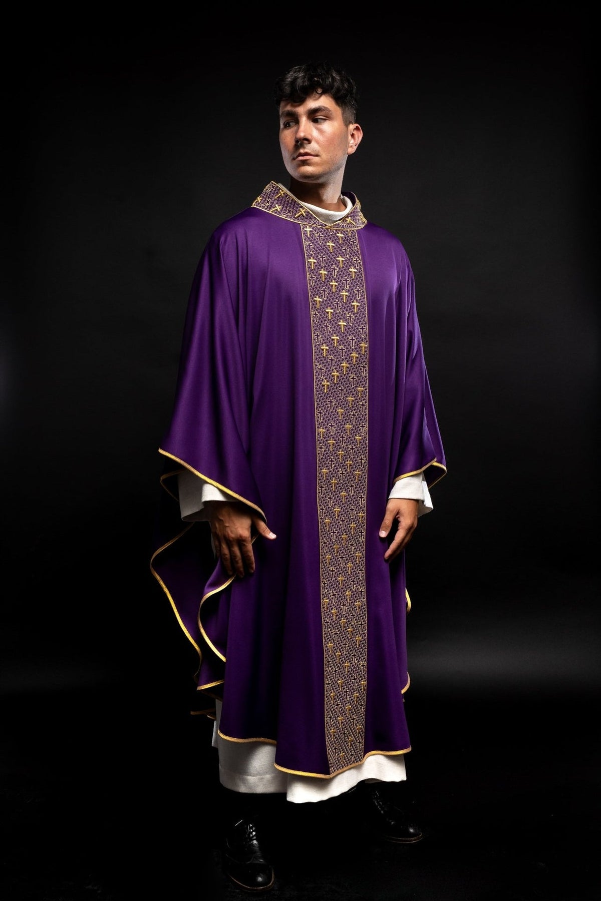 Purple chasuble, full front view with gold cross embroidery