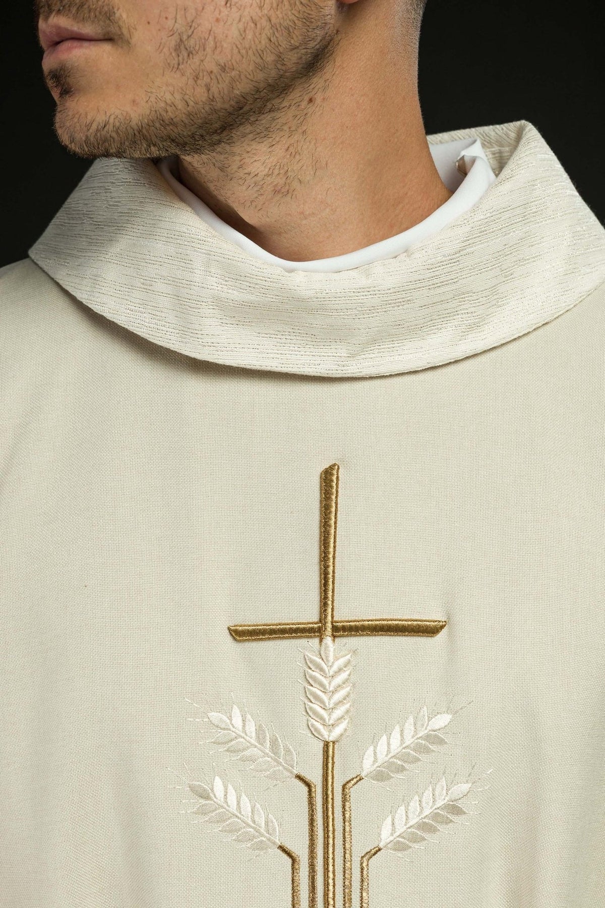 Ecru chasuble close-up of stand-up collar and cross embroidery