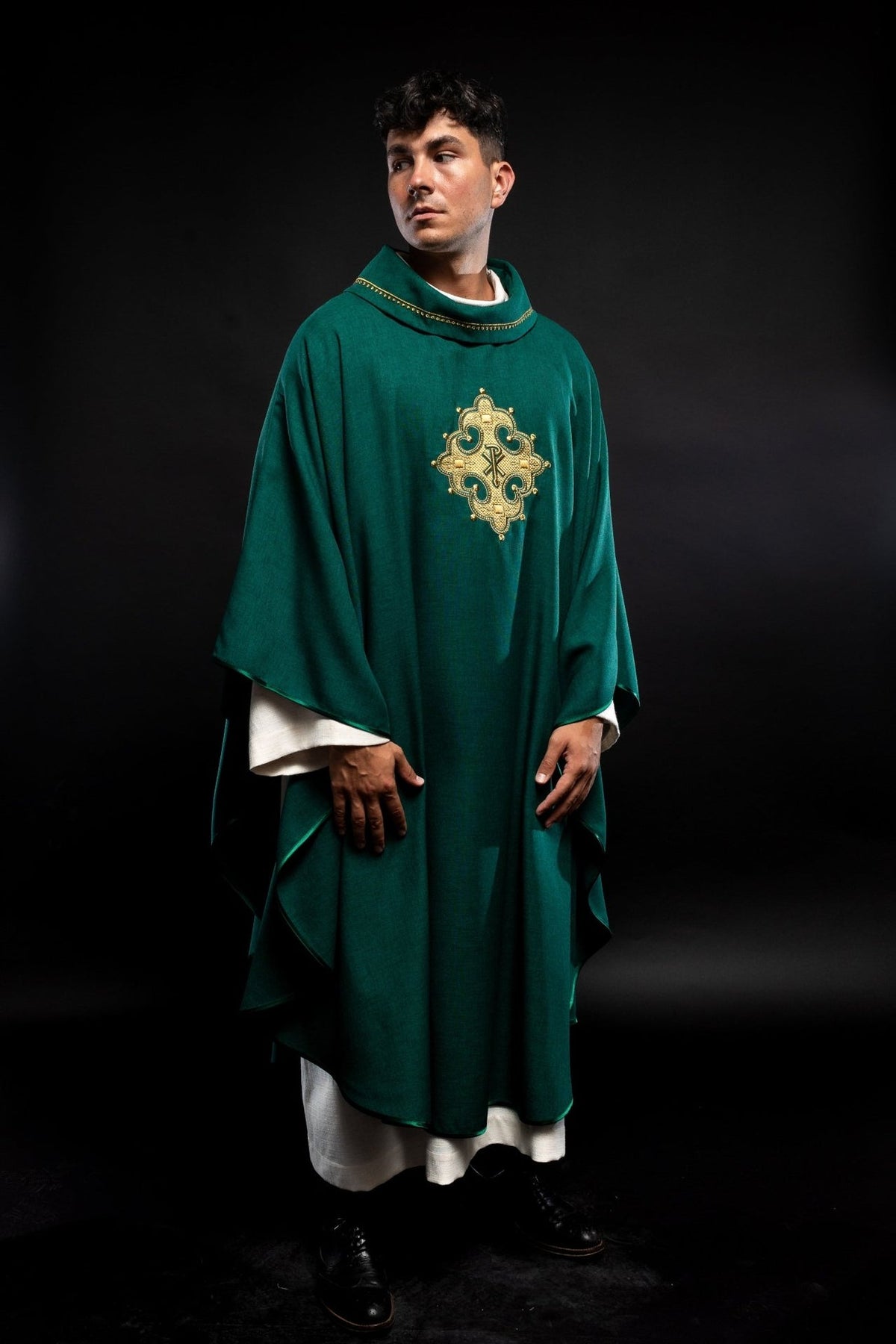 Green chasuble front view with gold embroidered cross