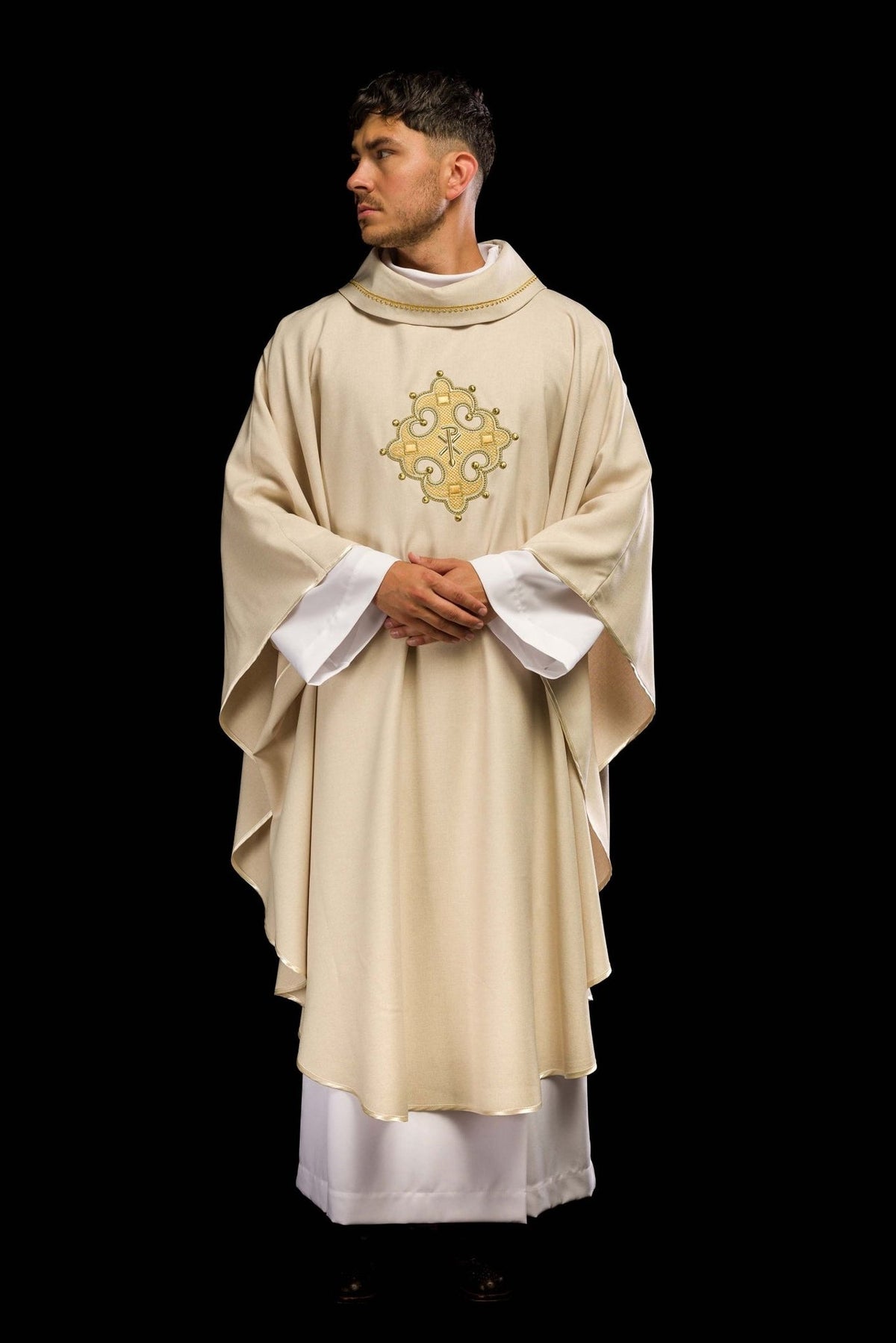 Ecru chasuble worn, full front view with embroidered cross