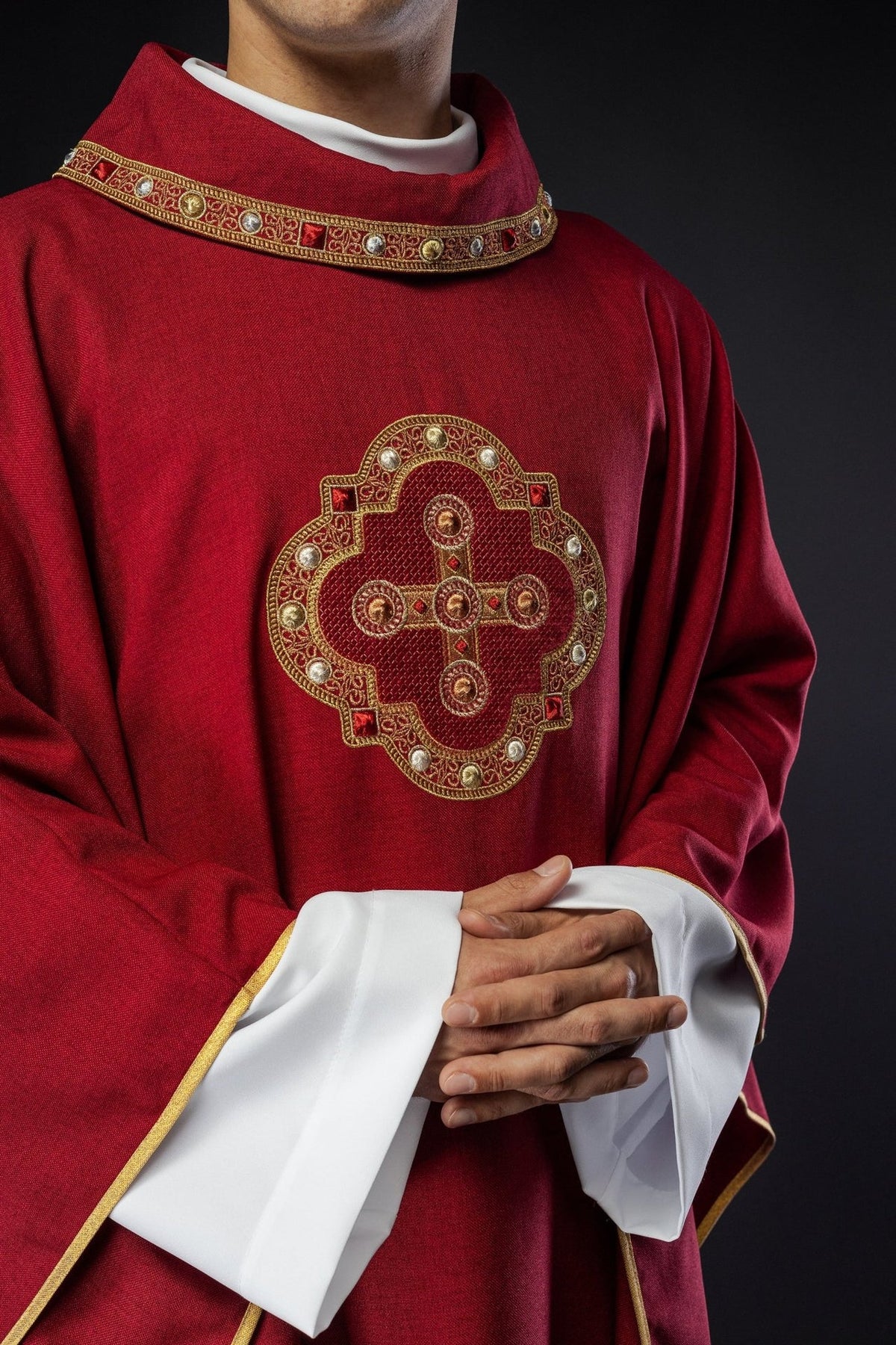 Red chasuble, front close-up showing gold embroidery and collar trim
