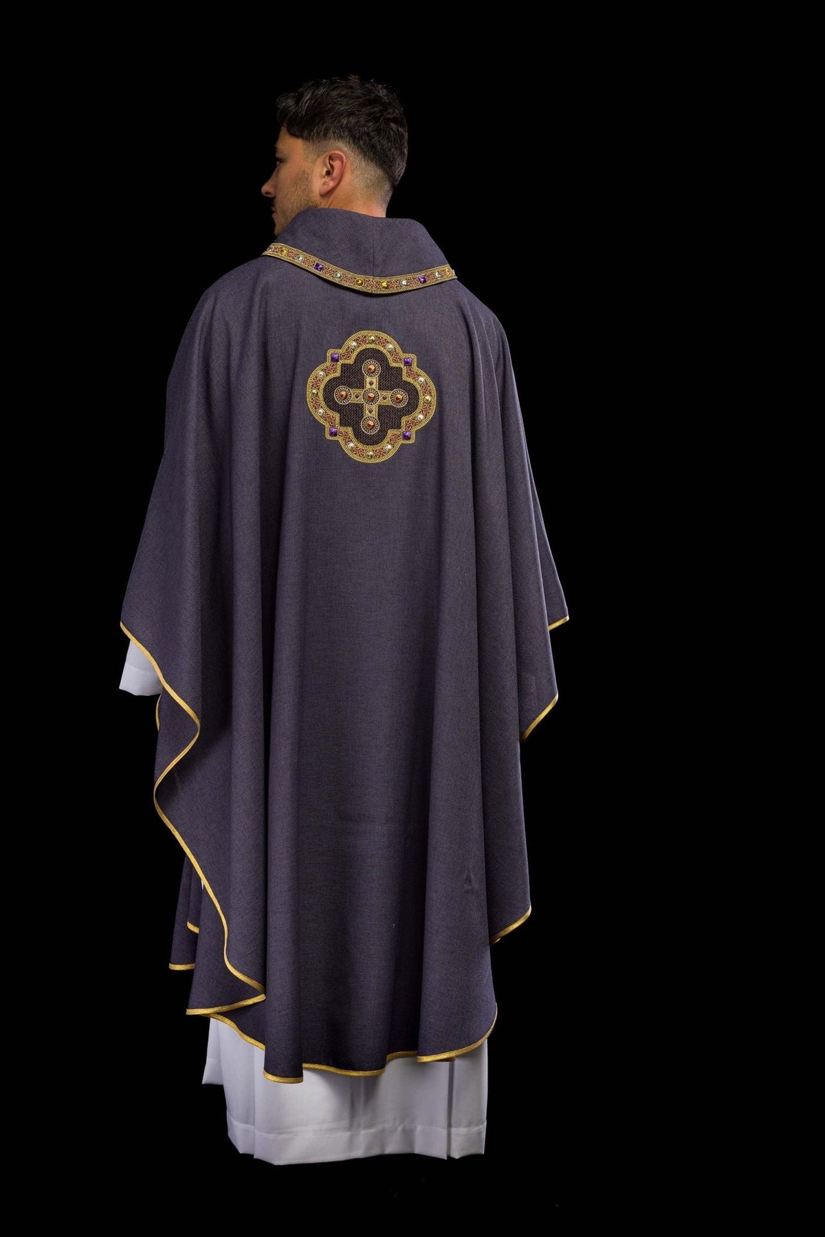 Purple chasuble back view with embroidered cross and collar trim