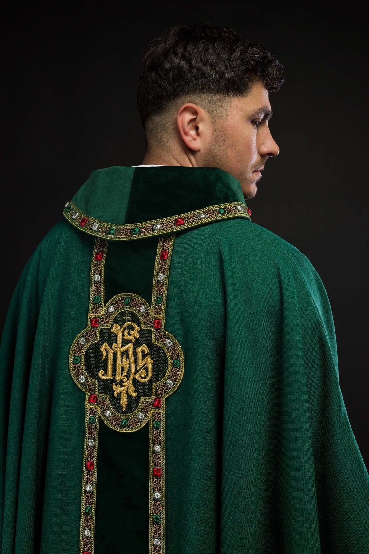 Green chasuble back view with embroidered orphrey and IHS motif