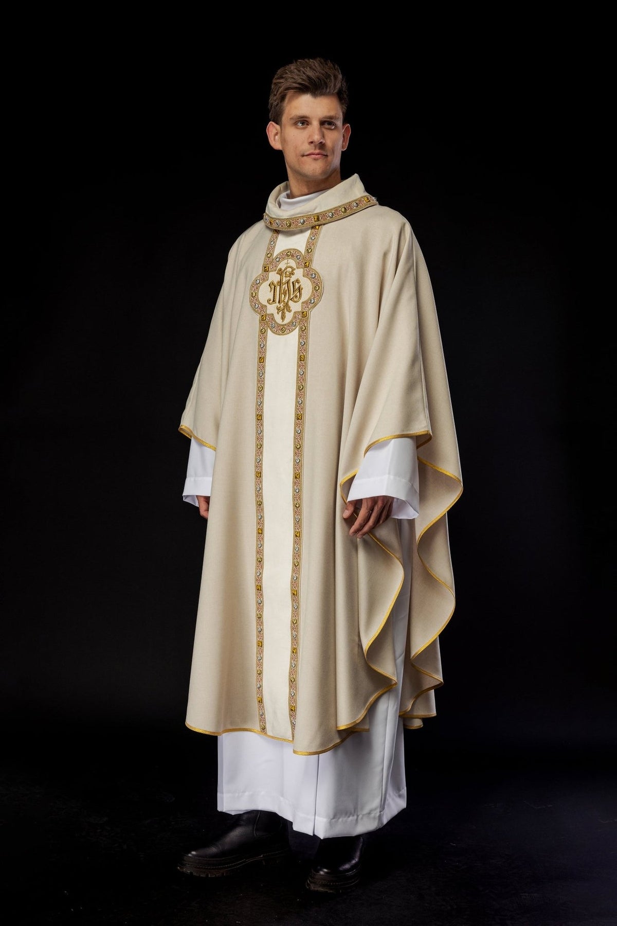 Ecru chasuble worn in three-quarter front view with embroidered orphrey