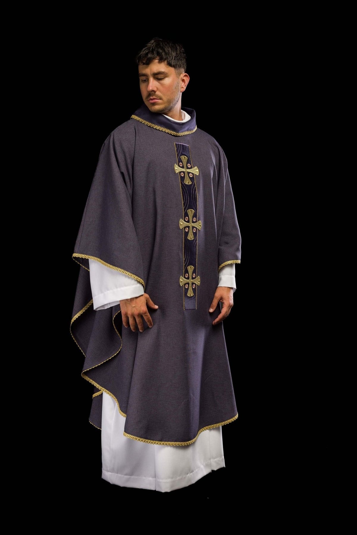 Purple chasuble side view with gold cross embroidery and trim