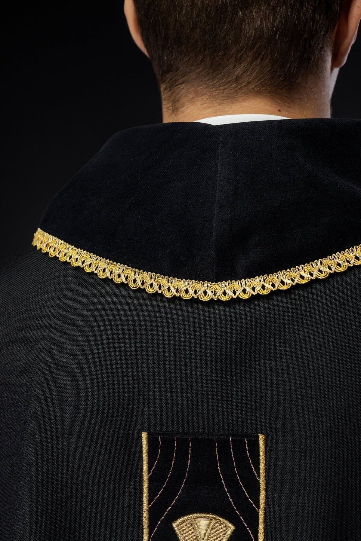 Chasuble black collar close-up with gold trim