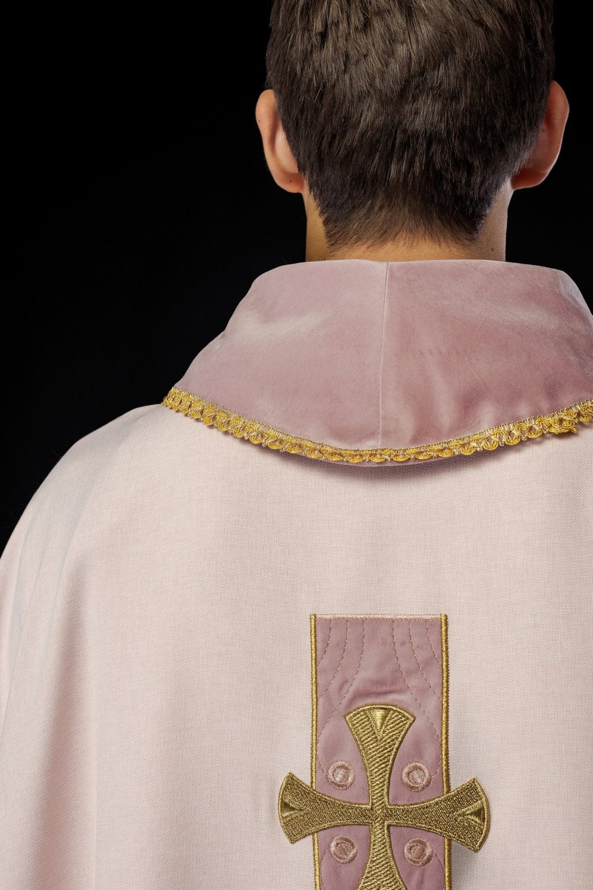 Rose chasuble back view with embroidered gold crosses