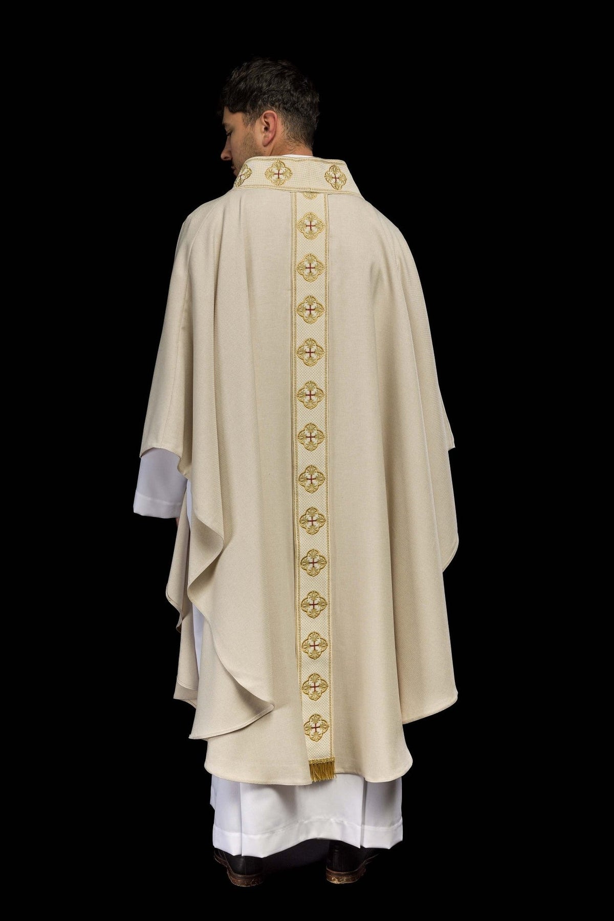 Ecru chasuble back view with gold embroidered orphrey and crosses