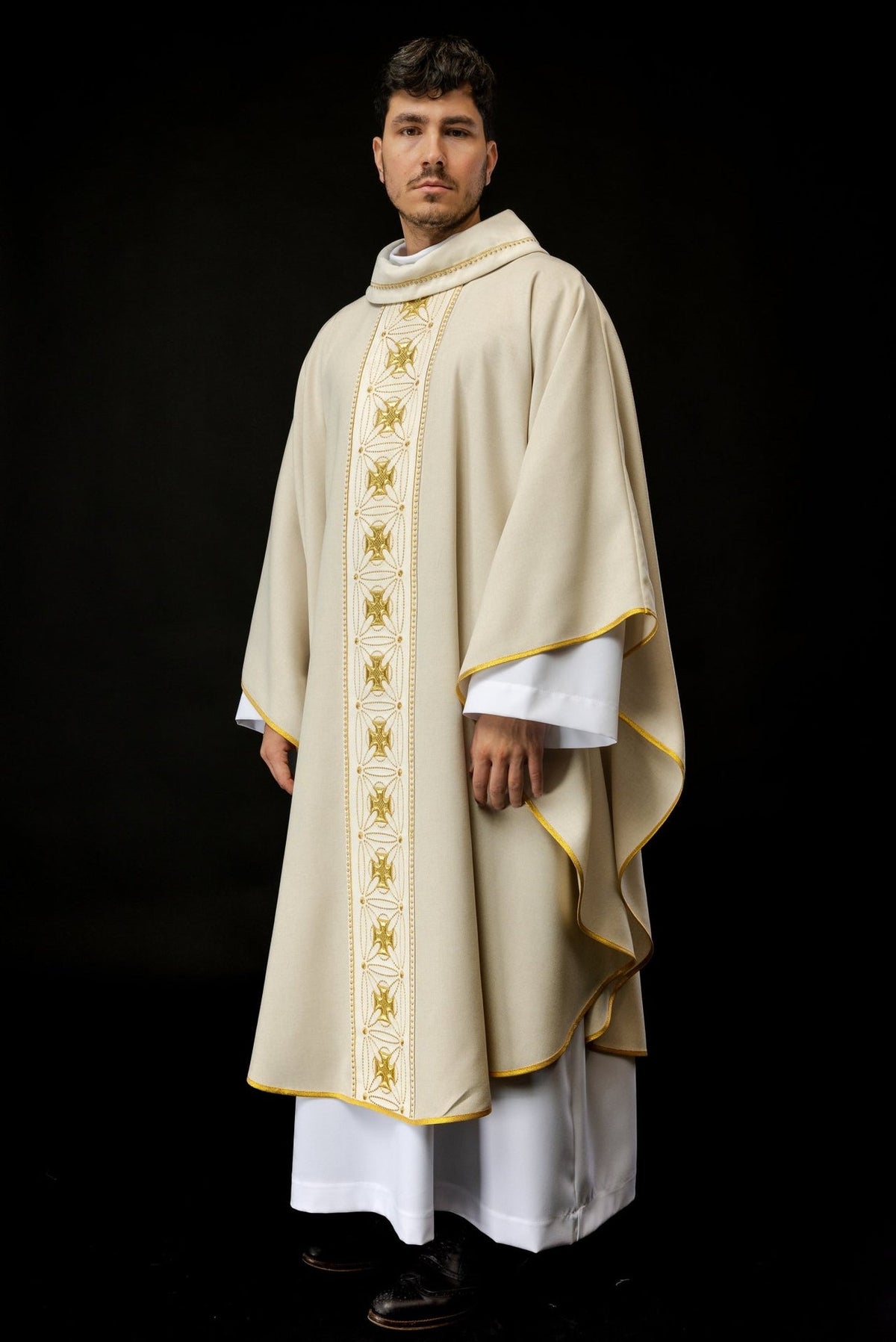 Ecru chasuble front view with gold embroidered cross orphrey and trim
