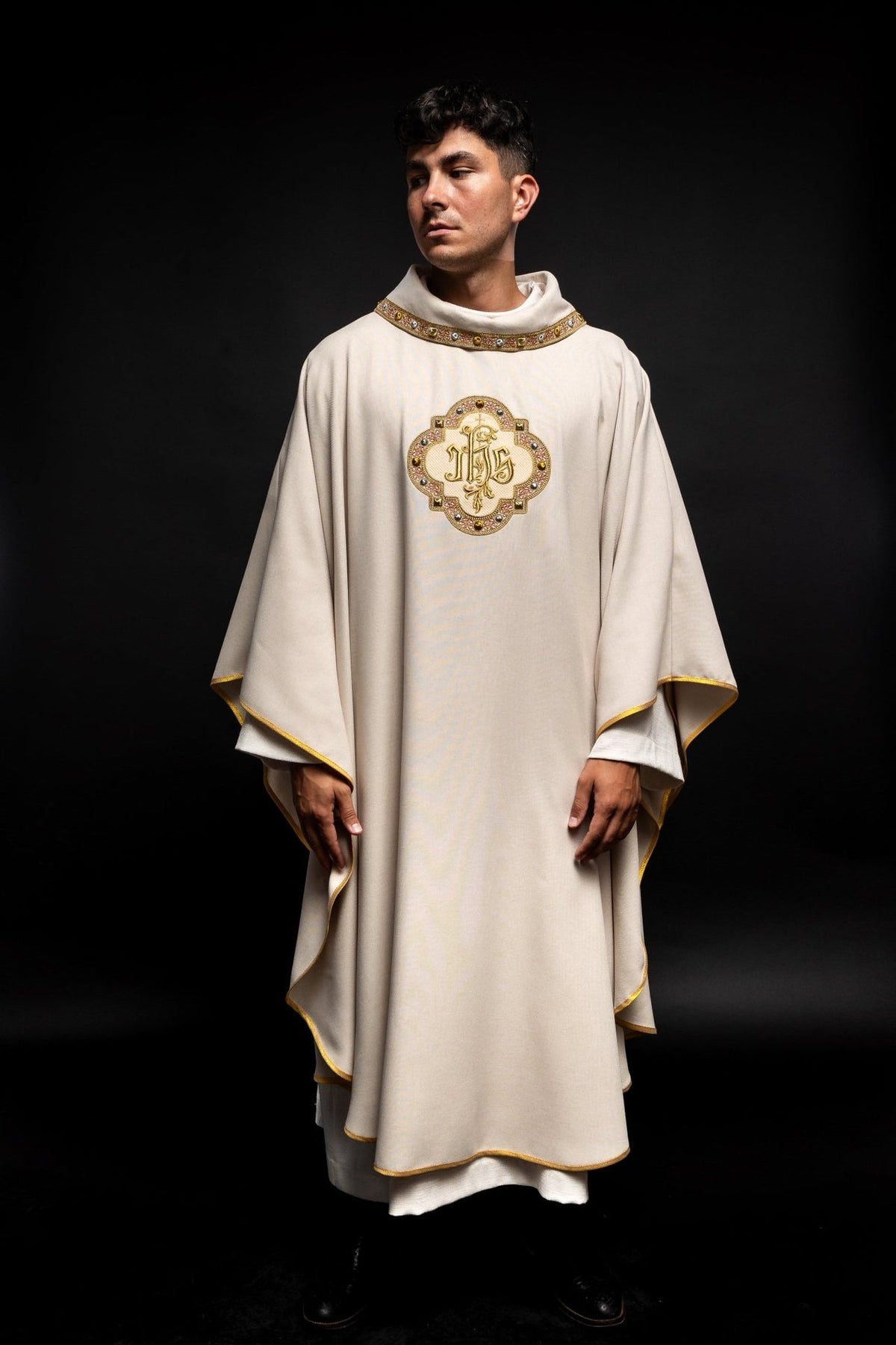 Ecru chasuble front view with IHS embroidery and gold trim