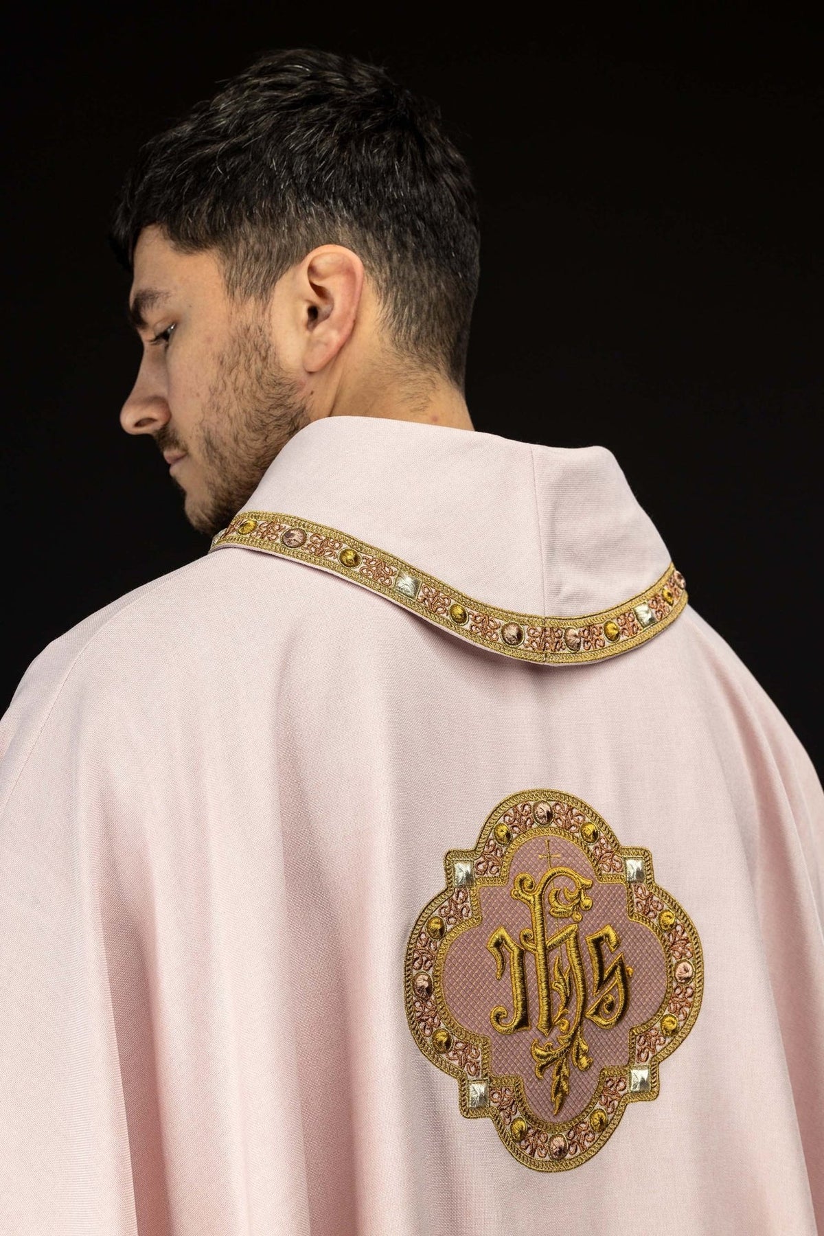 Rose chasuble back view with IHS embroidery and collar trim