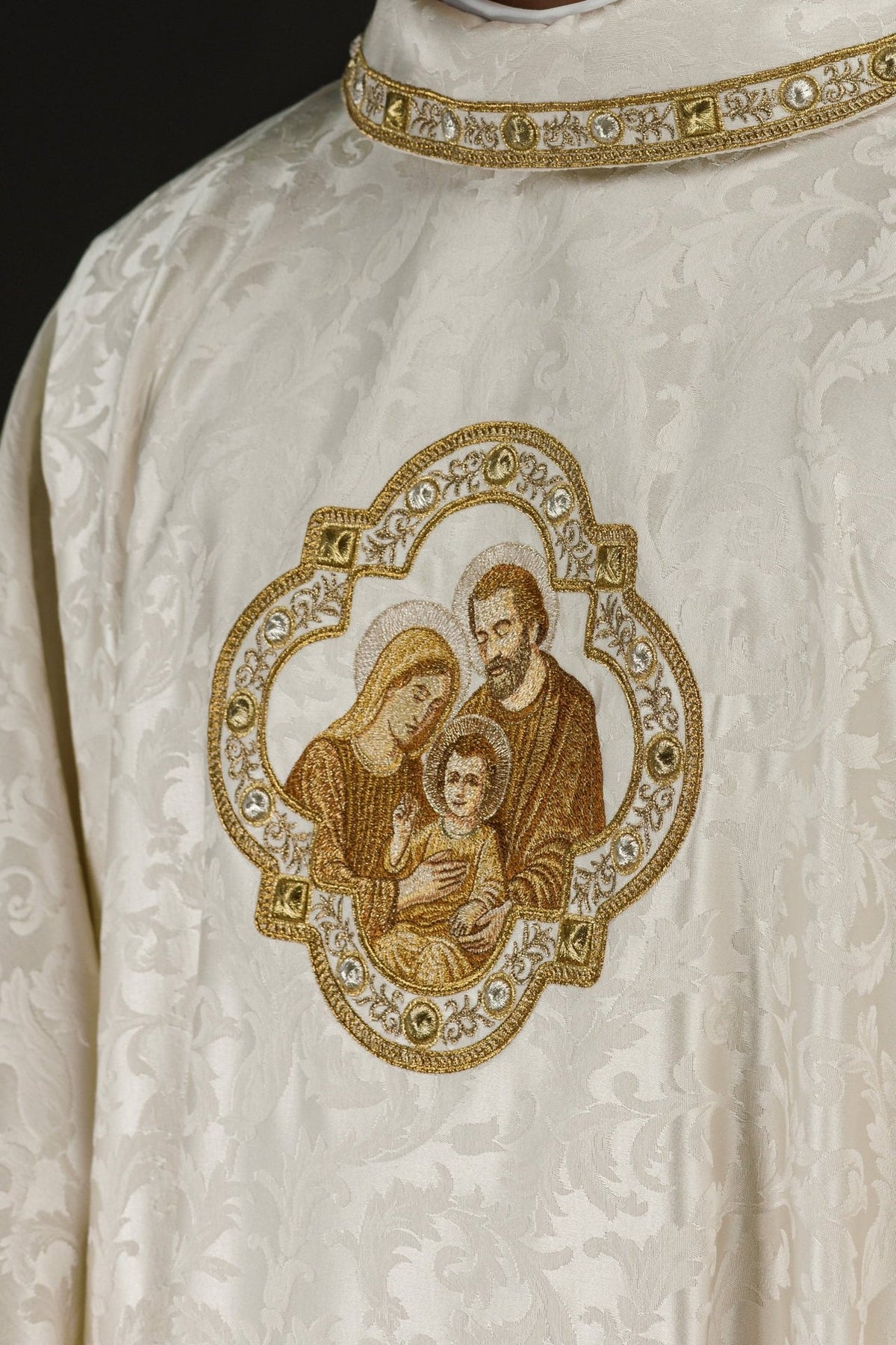 Holy Family embroidery on the ivory Christmas chasuble, close-up view