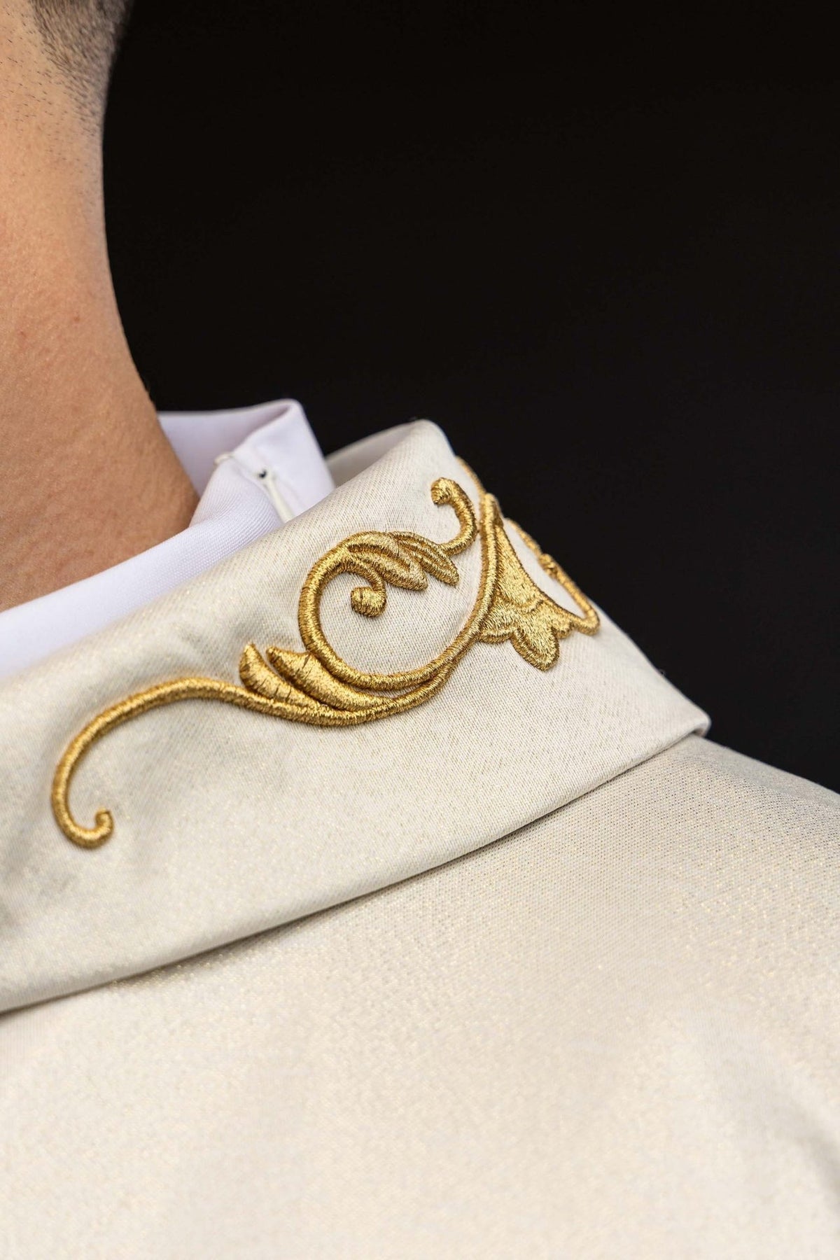 Marian chasuble detail of gold embroidered sleeve motif