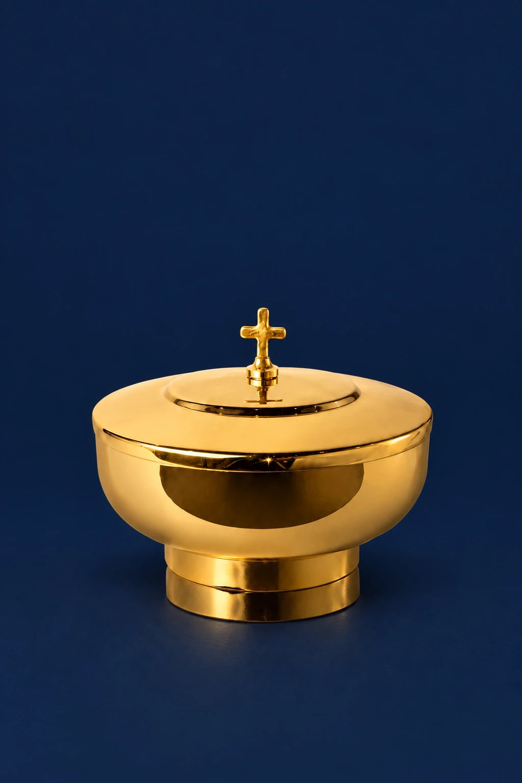 Gold-plated brass ciborium, front view with fitted lid and cross finial