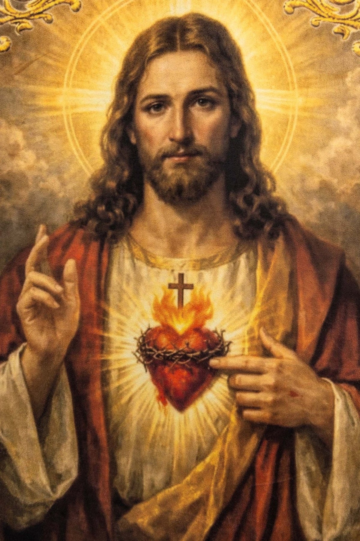 Church banner close-up of Sacred Heart of Jesus with radiant halo and red heart