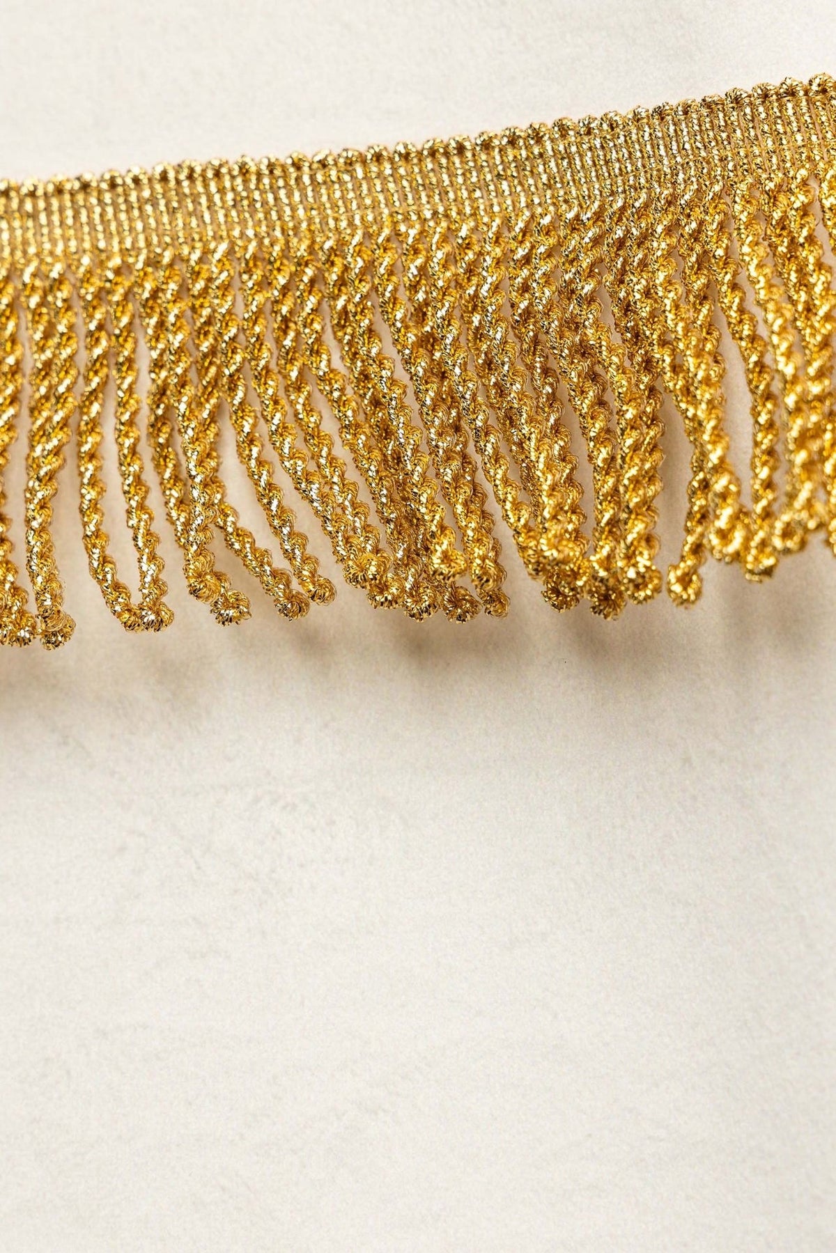 Church banner gold fringe close-up