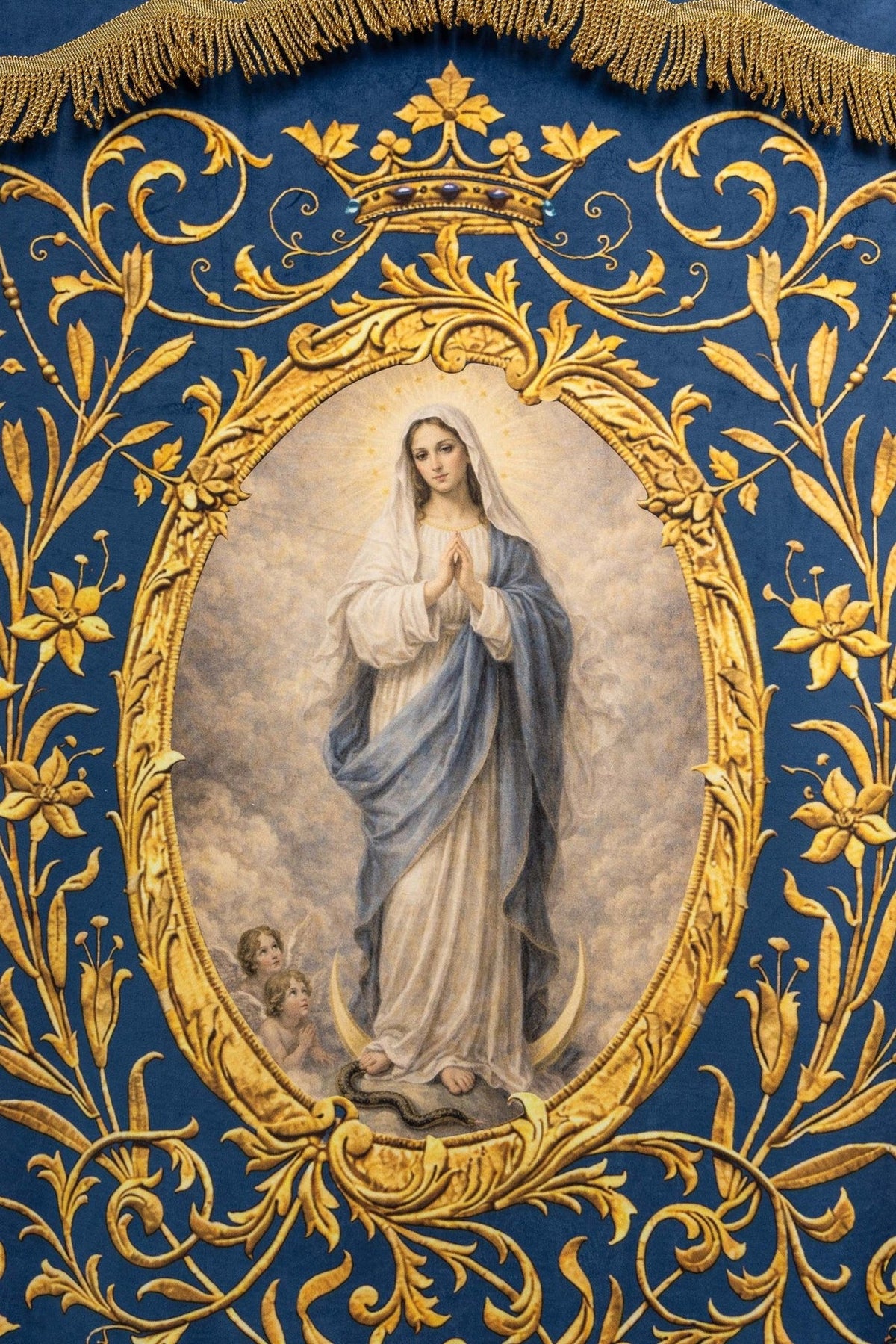 Church banner front close-up showing Our Lady, crown and gold ornamental frame