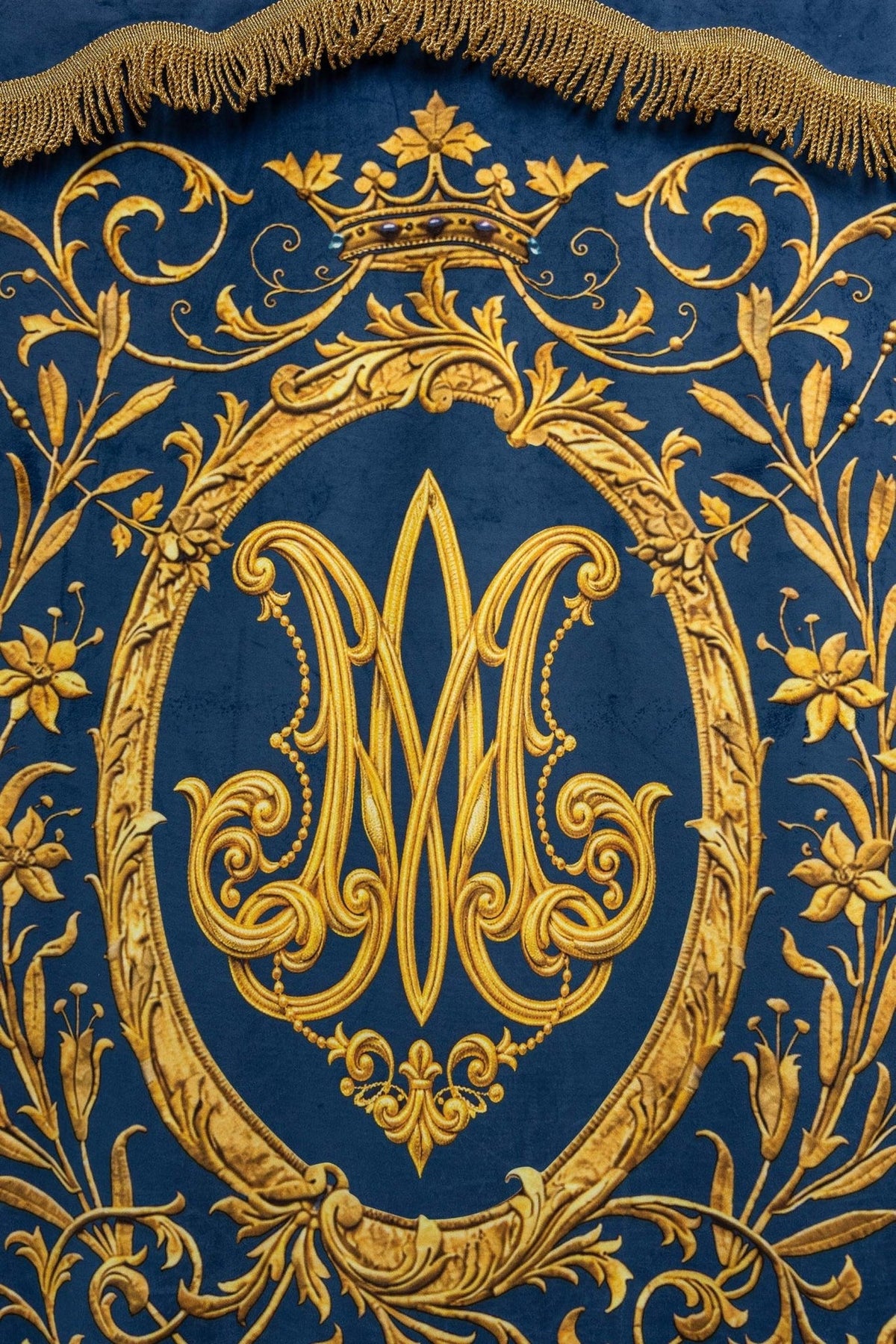 Church banner detail of blue pointed edge with gold fringe
