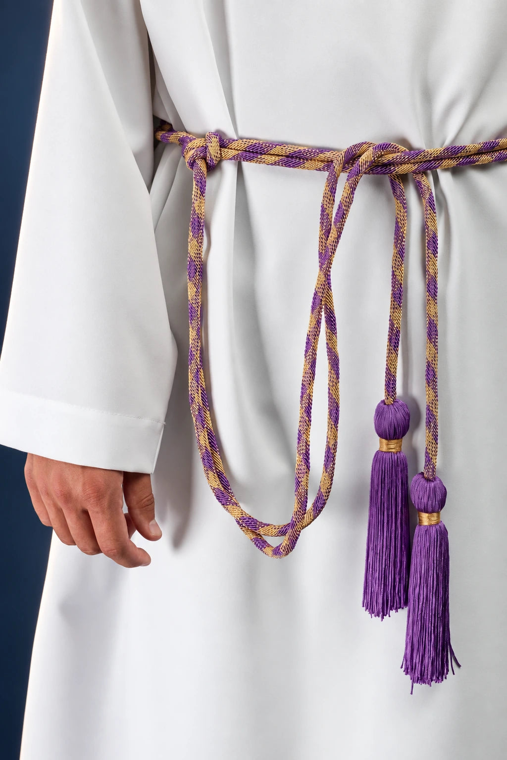 Premium Purple and Gold Catholic Cincture worn around an alb, with two purple tassels