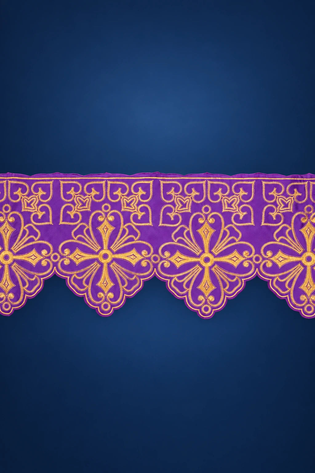 Close-up of purple altar lace with gold rosette embroidery and scalloped edge