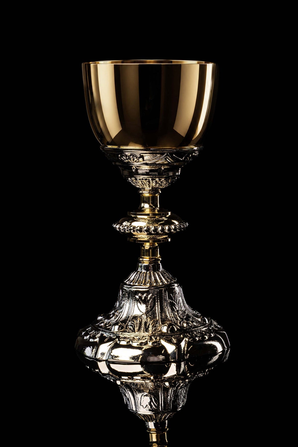 Baroque-Style Gold and Silver Chalice shown in full front view with ornate silver and gold relief