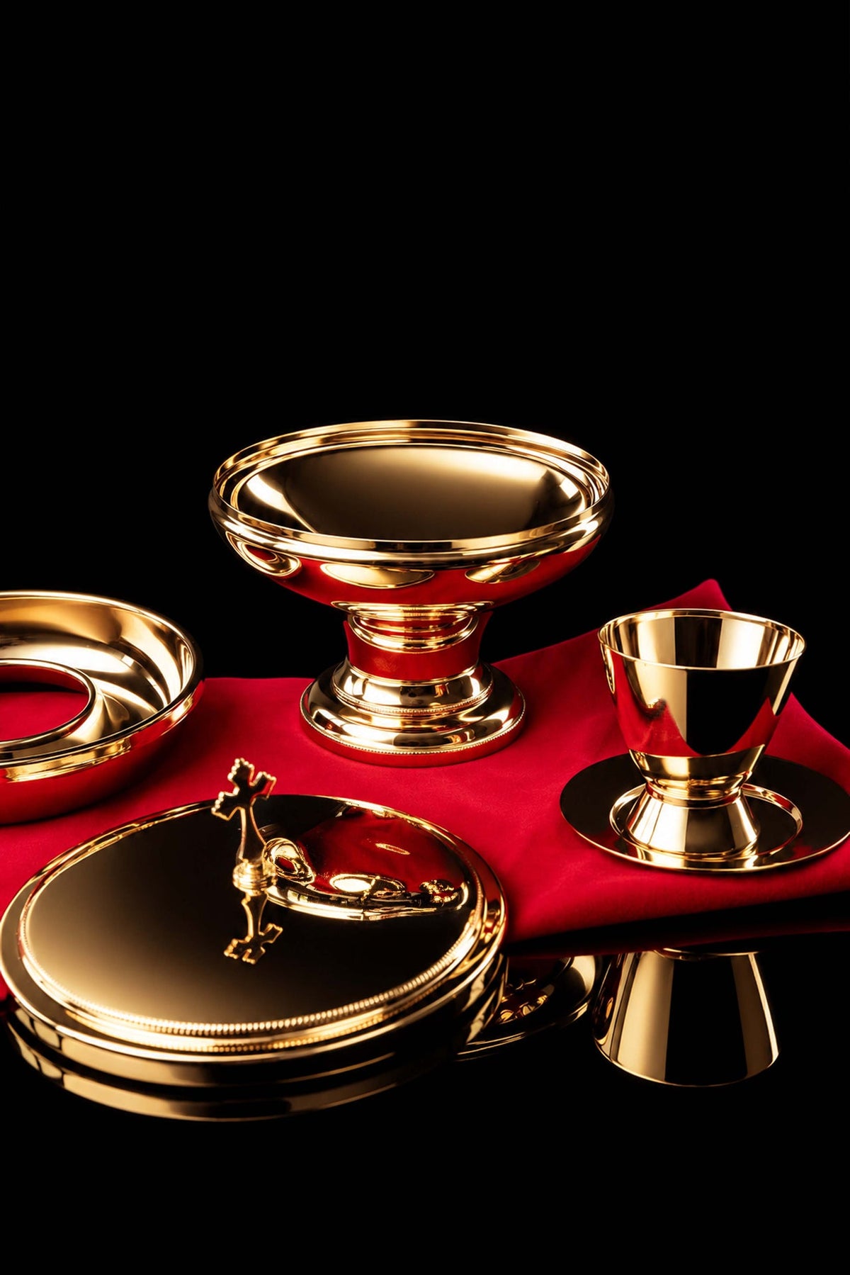 Collection of matching gold-plated liturgical vessels