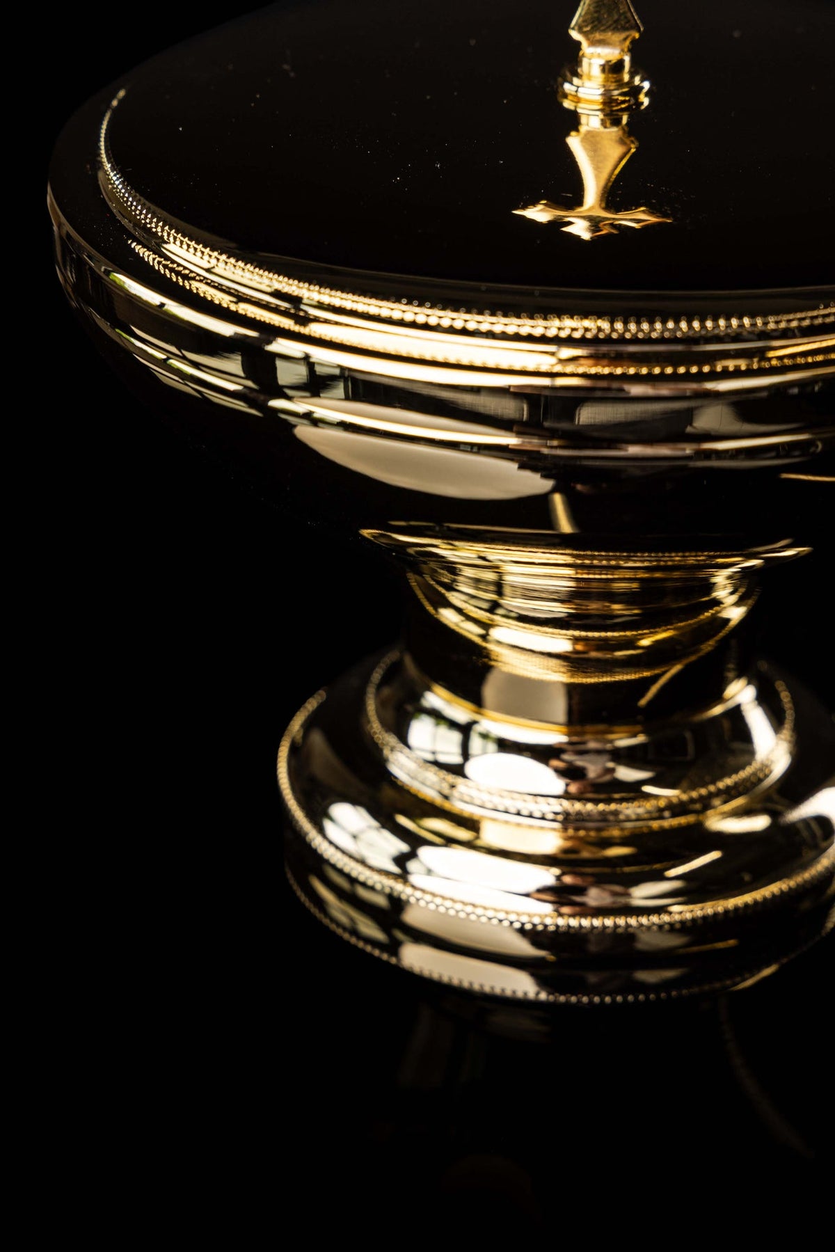 Ciborium lid and upper bowl with beaded rim in close-up