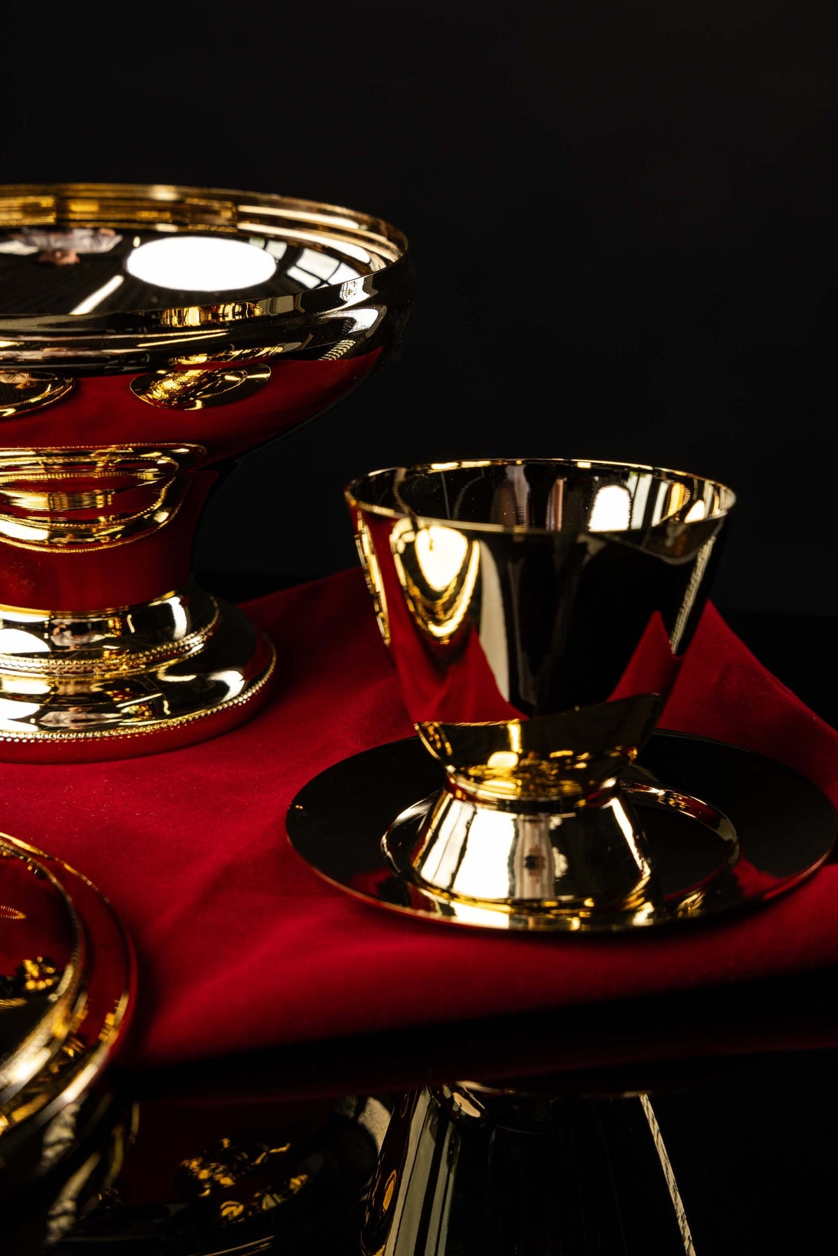 Ciborium shown with its cross-topped lid and polished bowl