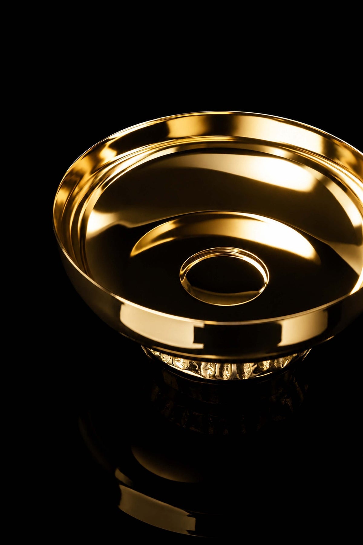 Gold-plated brass paten, close-up of polished interior and concentric rim
