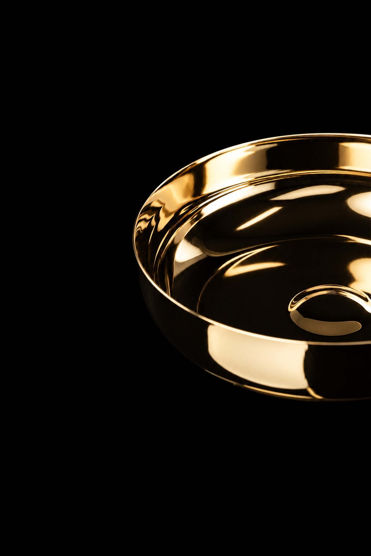 Gold-plated brass paten close-up of the polished interior and central raised detail