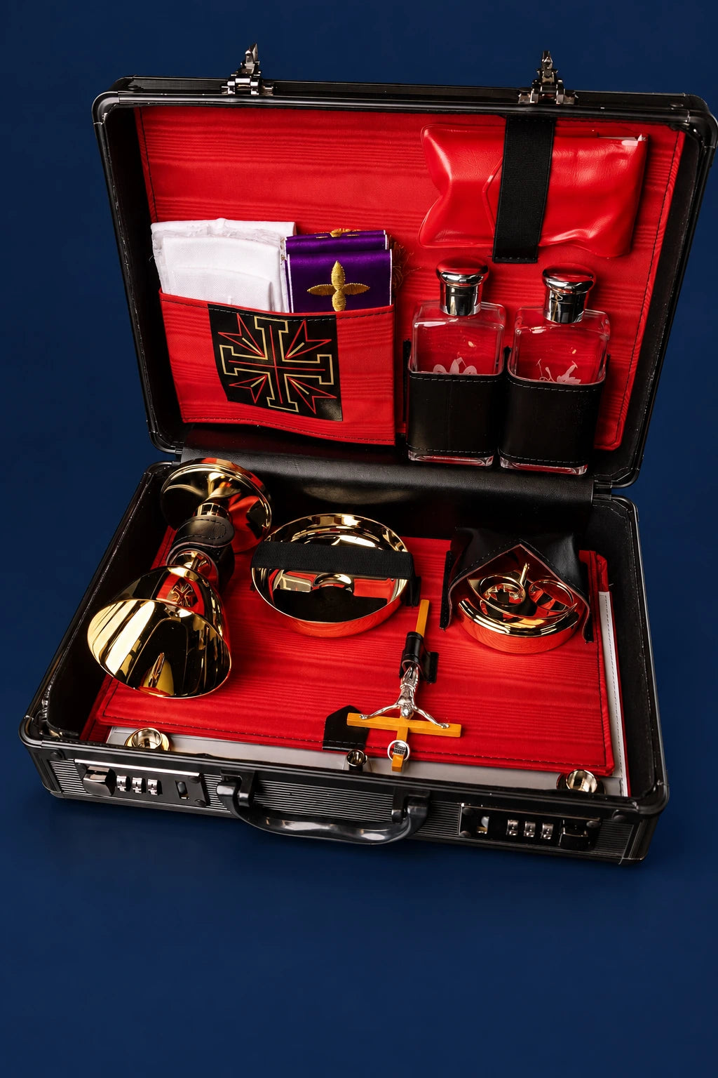 Mission Case with Complete Liturgical Equipment open, displaying gold vessels, linens, bottles, candles and cross