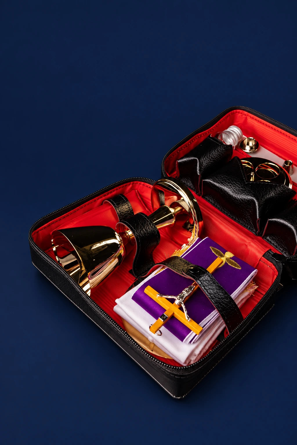 Mission Suitcase with Liturgical Equipment and Shoulder Strap open, showing red lining and liturgical items