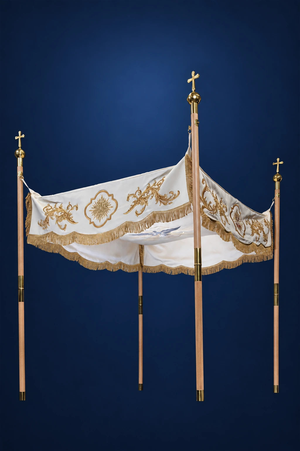 Ecru canopy with gold embroidery and fringed hem, shown draped over four poles in a front view
