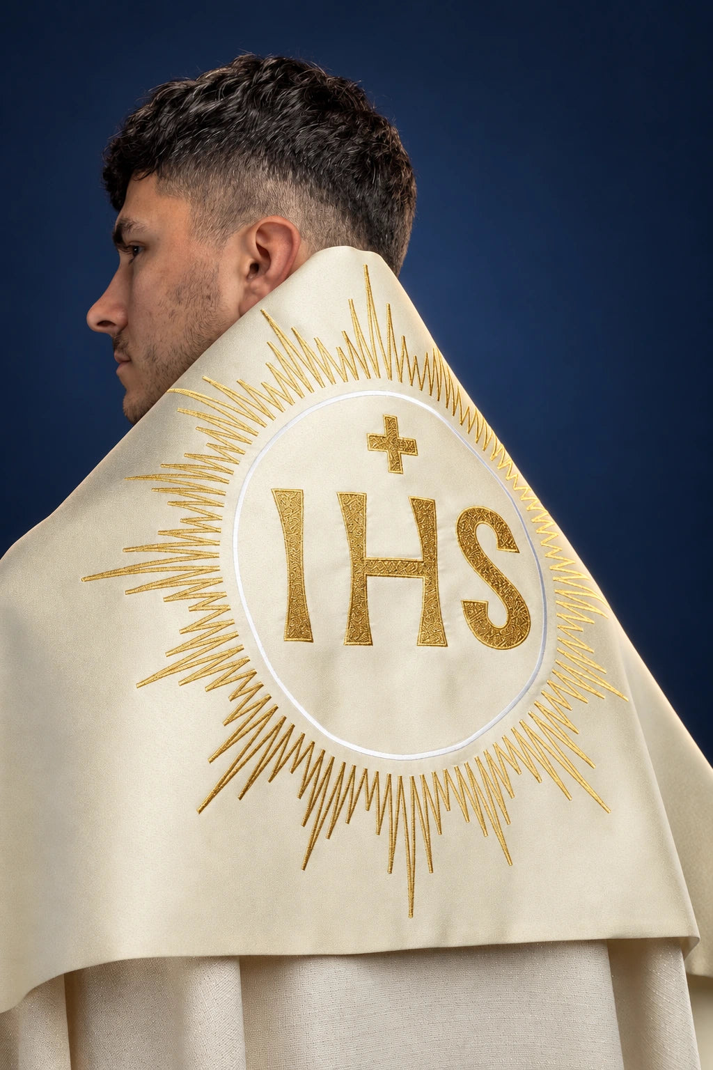 Ecru humeral veil, back view, with gold IHS medallion and radiant sunburst embroidery.