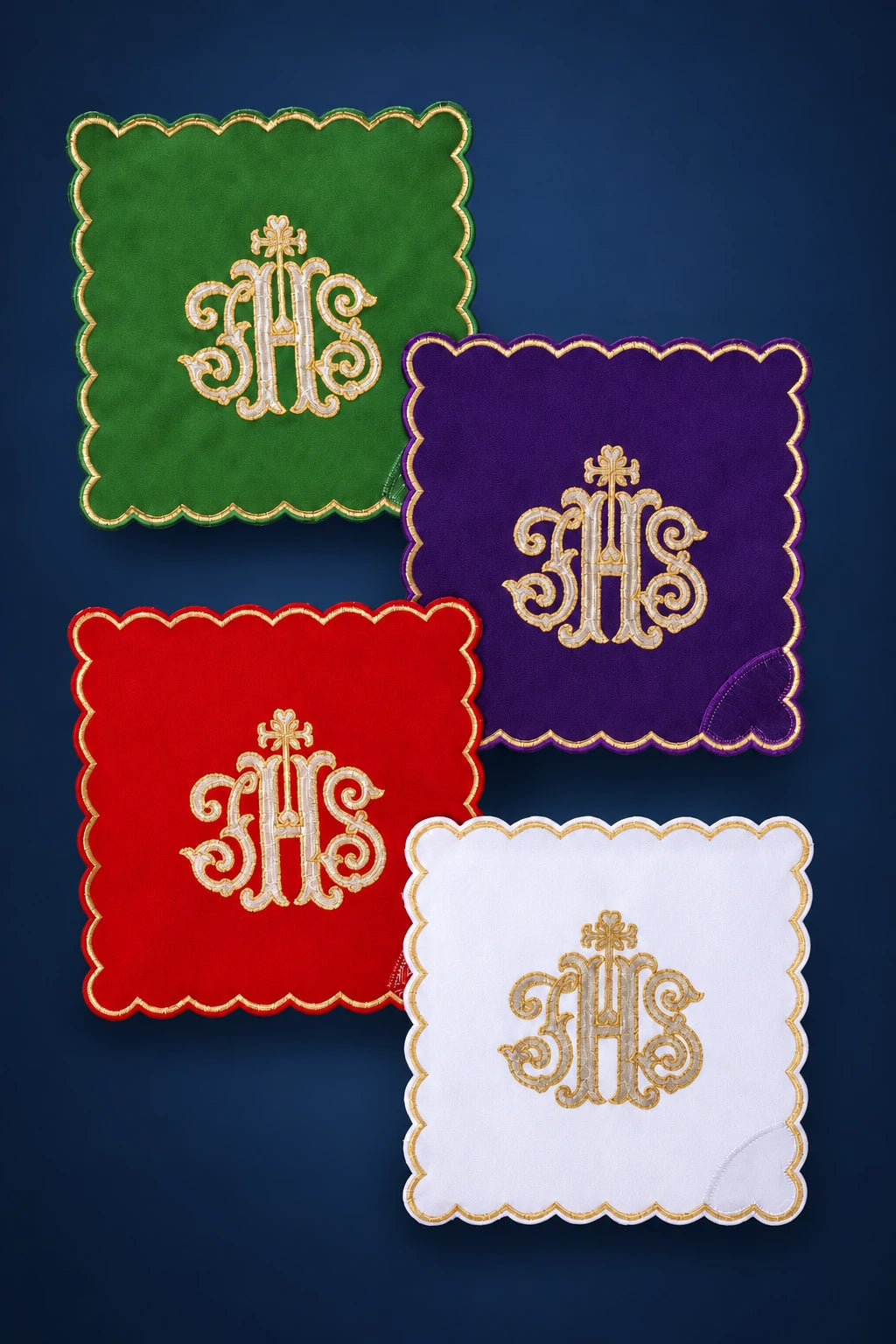 Four square chalice palls in green, purple, red, and white with scalloped trim and IHS embroidery