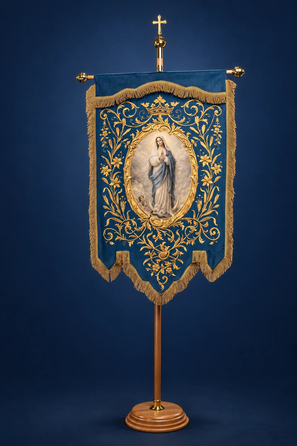 Front view of a blue church banner with Marian monogram and oval Madonna medallion, trimmed in gold fringe