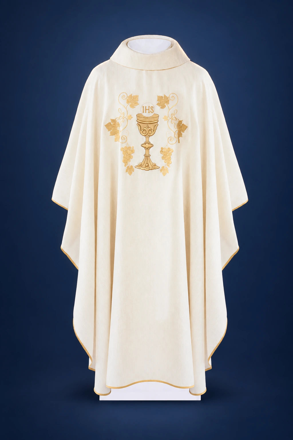 Front view of an ecru chasuble with gold chalice and vine embroidery at the chest